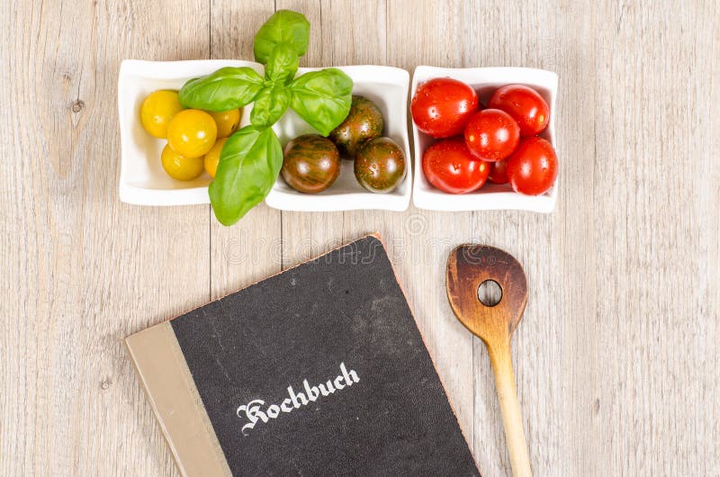Recipe book and wooden spoon royalty free stock images Recipe book and wooden spoon royalty free stock images