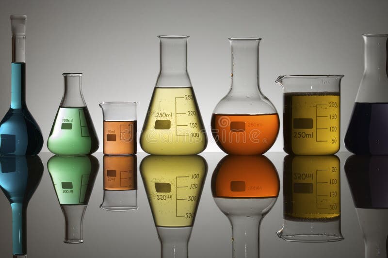 Laboratory containers with multicolored liquids. Laboratory containers with multicolored liquids