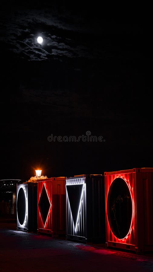 Rectangular industrial boxes with LEDs during night