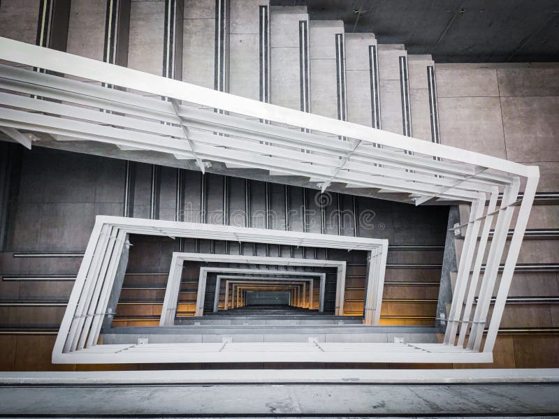 Rectangular staircase view from above symmetry. Endless rectangular staircase to the floor from the ceiling with symmetry