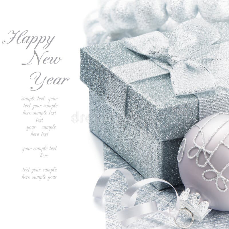 Christmas gift box with festive decoration in silver tone. Christmas gift box with festive decoration in silver tone