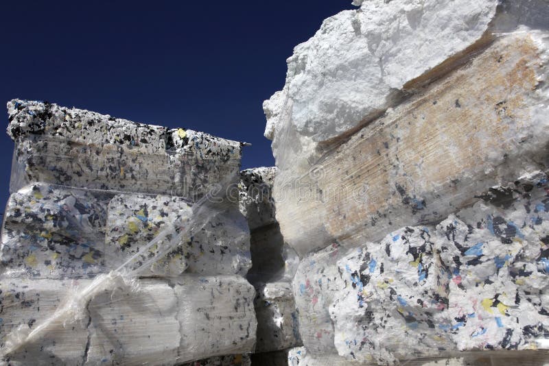 Shredded and packed styrofoam at a recycling center. Shredded and packed styrofoam at a recycling center