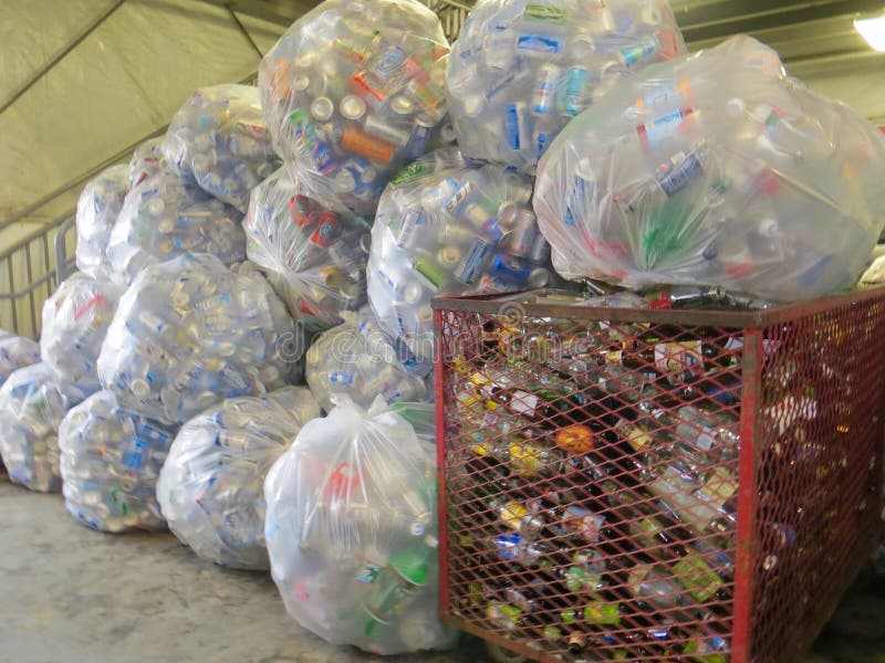 Recycling Cans In Plastic Bags At A Dump Or Recycling Center. Editorial Photo - Image of collect ...