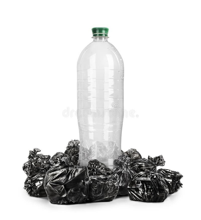 Recycling Concept. a Plastic Bottle Surrounded by Trash Bags Stock