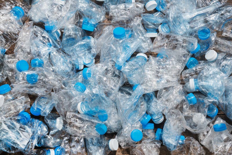 Recycling concept. problem of ecology, environmental pollution. Background of plastic bottles transparent blue net.