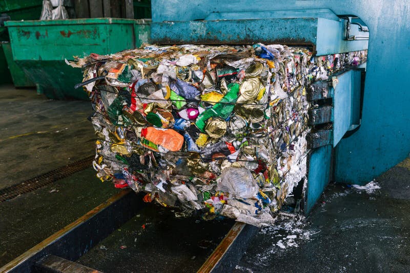 Recycling and sorting of household waste at the plant. Pressed trash for further processing. Recycling and storage of royalty free stock photo Recycling and sorting of household waste at the plant. Pressed trash for further processing. Recycling and storage of royalty free stock photo