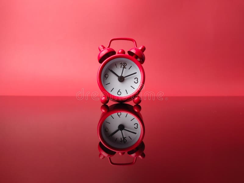 Red alarm clock with reflection stock photos