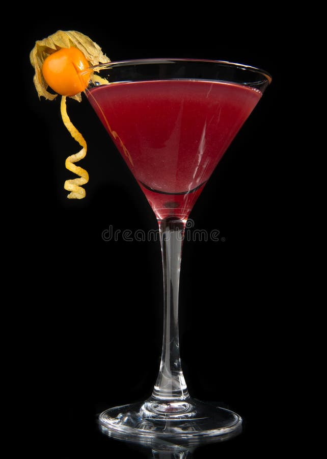 Red alcohol cosmopolitan cocktail on black background