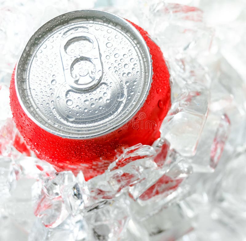 Red aluminum can with water drop in the a lot of ice