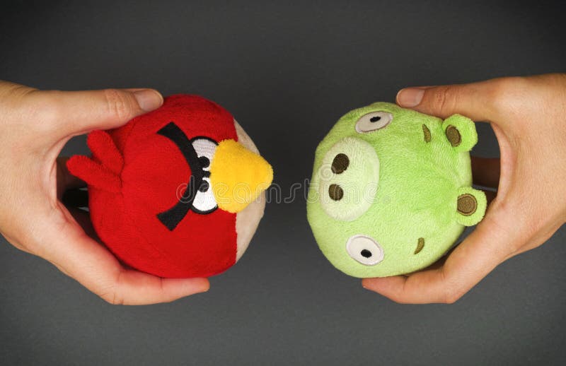 Red Angry Bird & Bad Piggy Soft Toys in Hands Editorial Photo - Image of  piggies, birds: 69354396