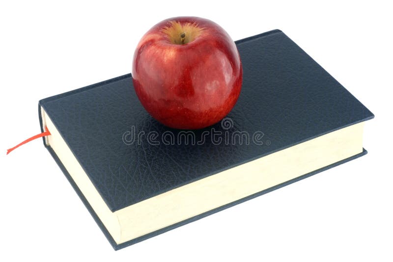 Red apple on black book