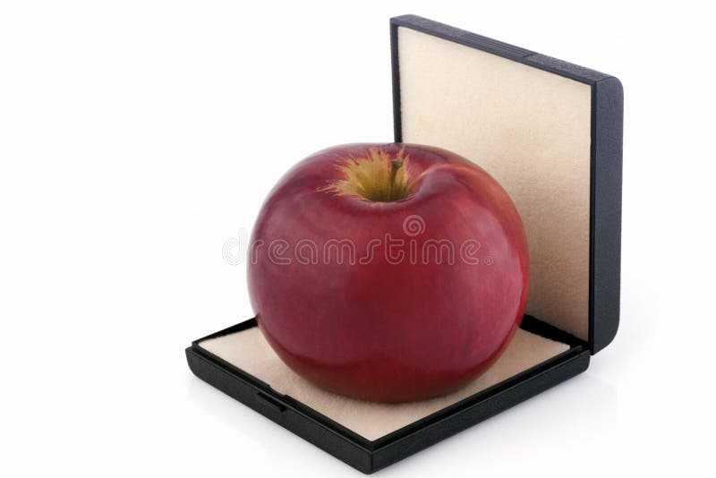 Red apple in box isolated