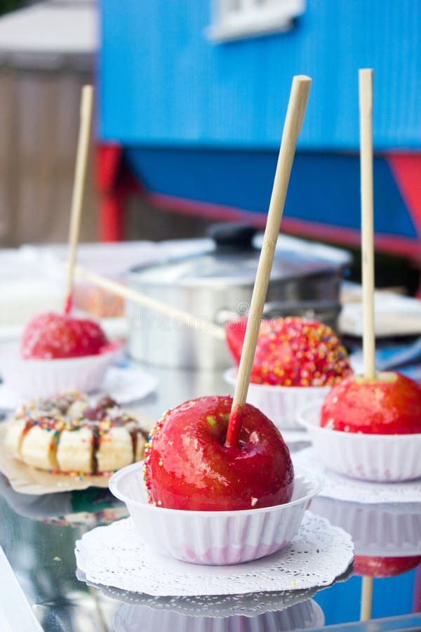 Red Apple Glaze with Sweet Caramel at Candy Shop. Stock Photo Image