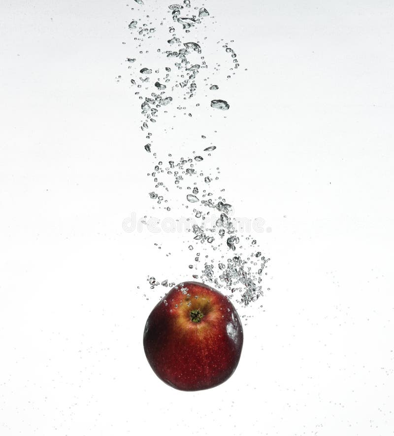 Red apple under water