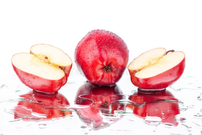 Red apples whole apple and cutted on white background isolated close up macro