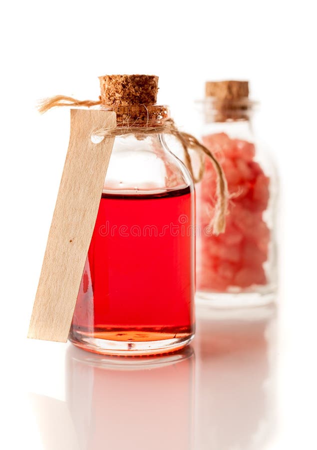 Red Aromatherapy Essential Oil and Sea Salt Stock Photo Image of