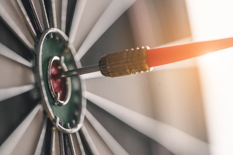 The red arrow in the middle of the dart board shown success. The concept of setting business goals Possible business planning. royalty free stock photos