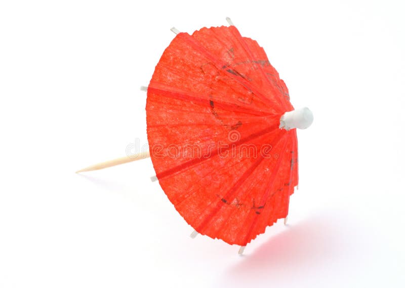 Red asian cocktail umbrella on white