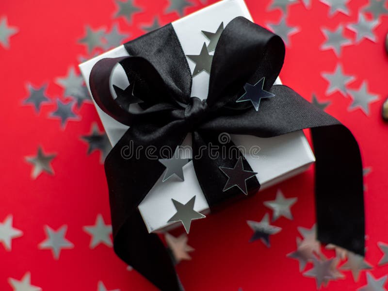 Black Gift Box. Silver Ribbons, Isolated. Stock Photo, Picture and Royalty  Free Image. Image 11763633.