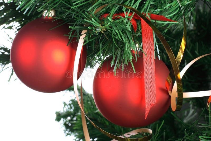 Red balls hanging from christmas tree