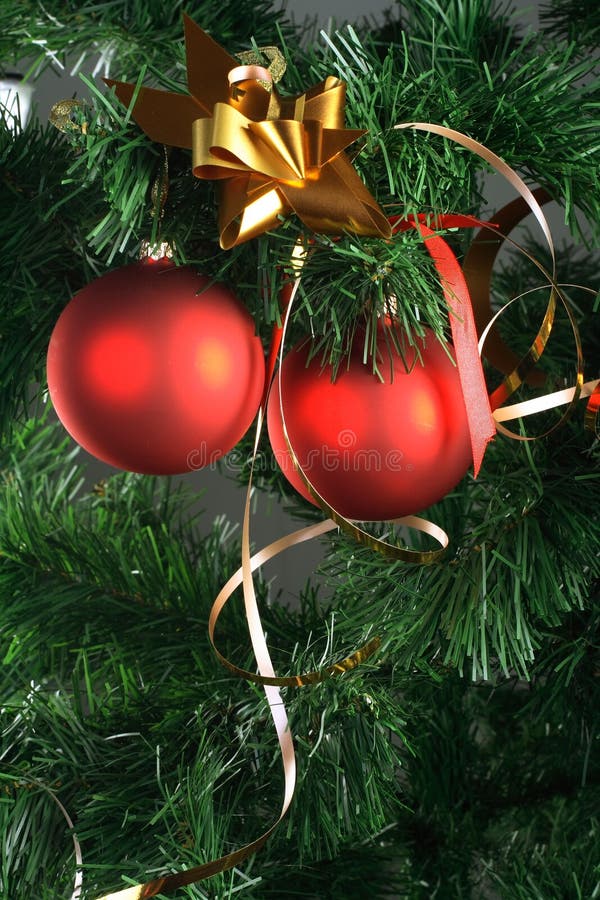 Red balls hanging from christmas tree