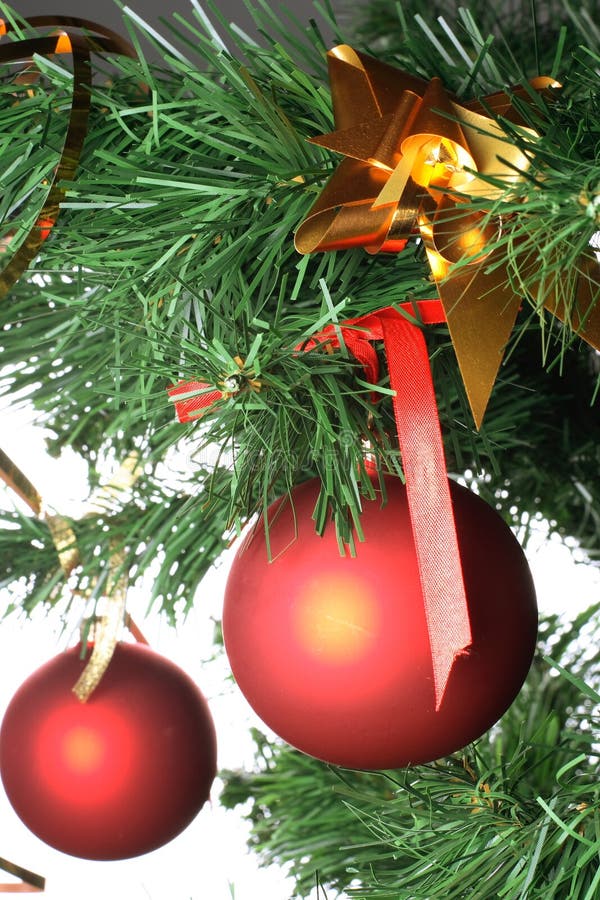 Red balls hanging from christmas tree