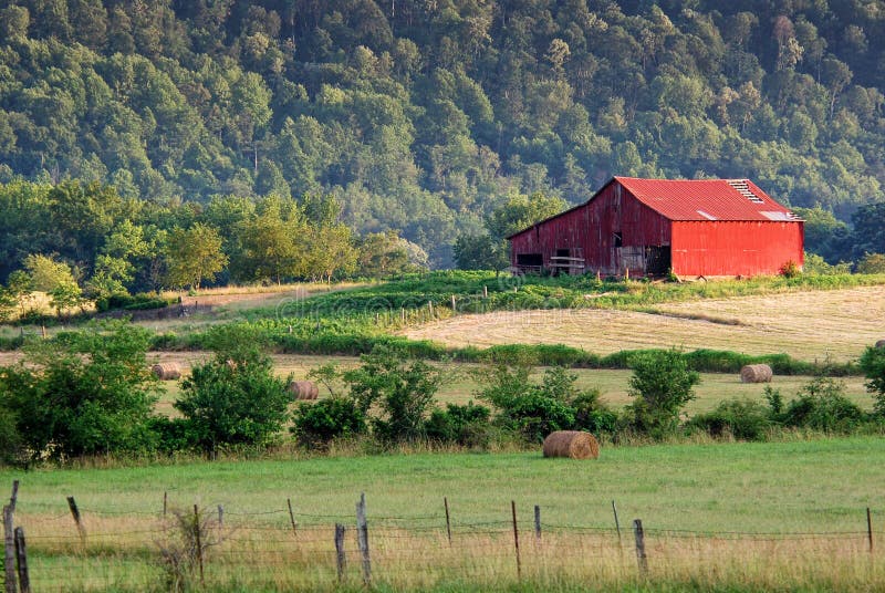 Red barn and pasture land stock photo. Image of pasture 20063328
