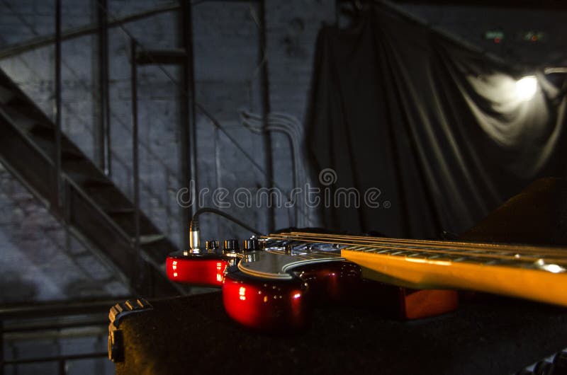 Red bass guitar close-up. Music instruments. Macro. royalty free stock images Red bass guitar close-up. Music instruments. Macro. royalty free stock images