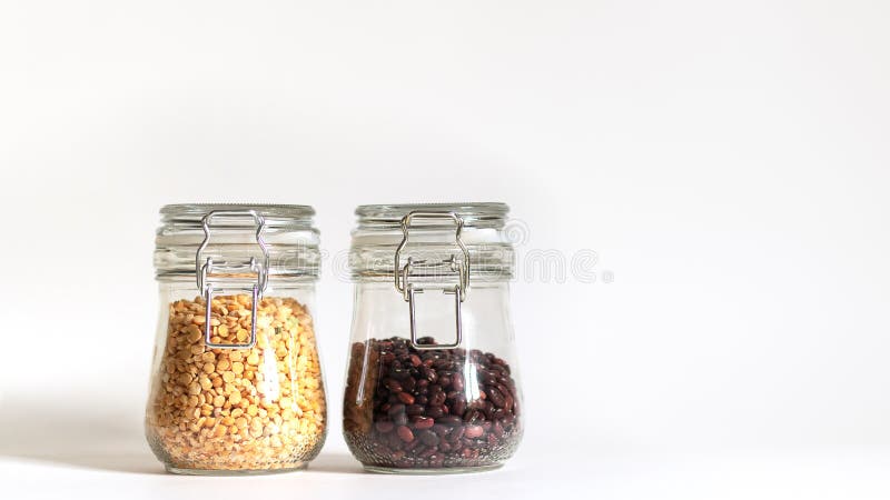 https://thumbs.dreamstime.com/b/red-beans-yellow-chopped-peas-tightly-closed-glass-container-legumes-stored-banks-healthy-food-vegetarianism-169206359.jpg