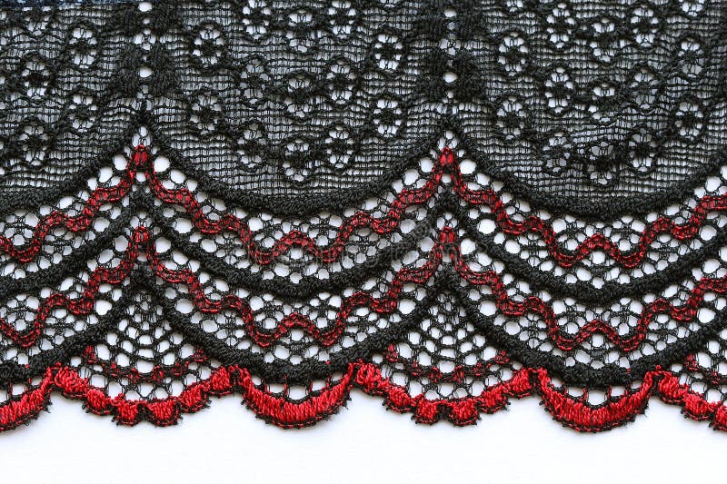 Red and black flowers lace material texture macro shot royalty free stock images Red and black flowers lace material texture macro shot royalty free stock images