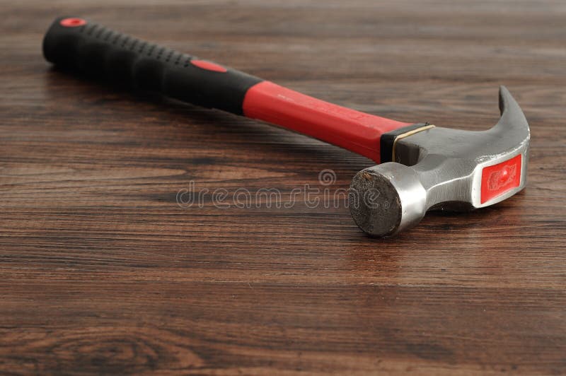 A red and black hammer stock image. Image of industry 76715563