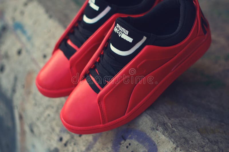 Red and Black Sneakers Alexander McQueen X Puma on Abstract Background. Krasnoyarsk, Russia - December 19, 2017 Editorial Photo - Image of comfort, brand: 173702338