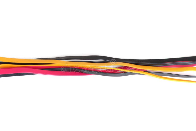 Red, Black and Yellow Cables Tangled Across a White Background. Stock
