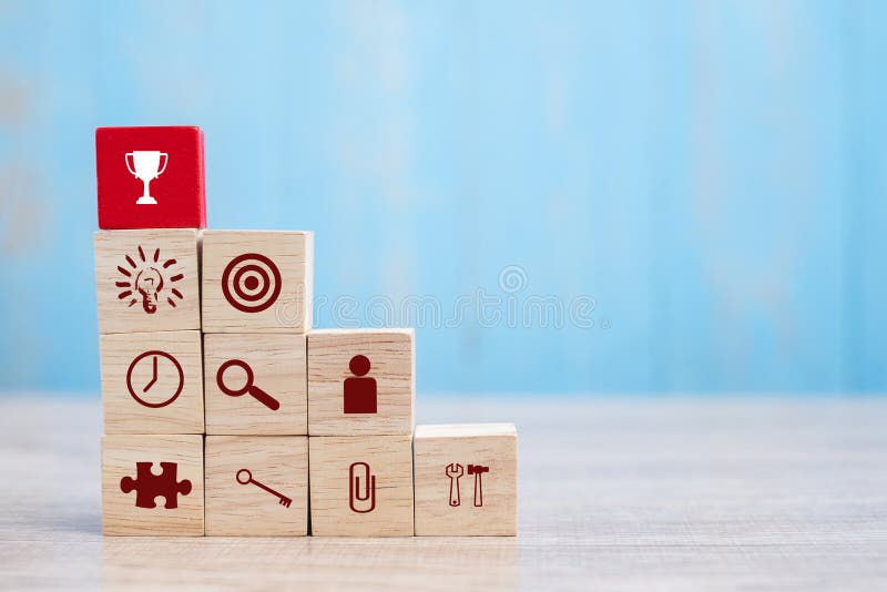 Red block with Trophy and business strategy icon on table background. Business Growth, Improvement, strategy, Successful, success