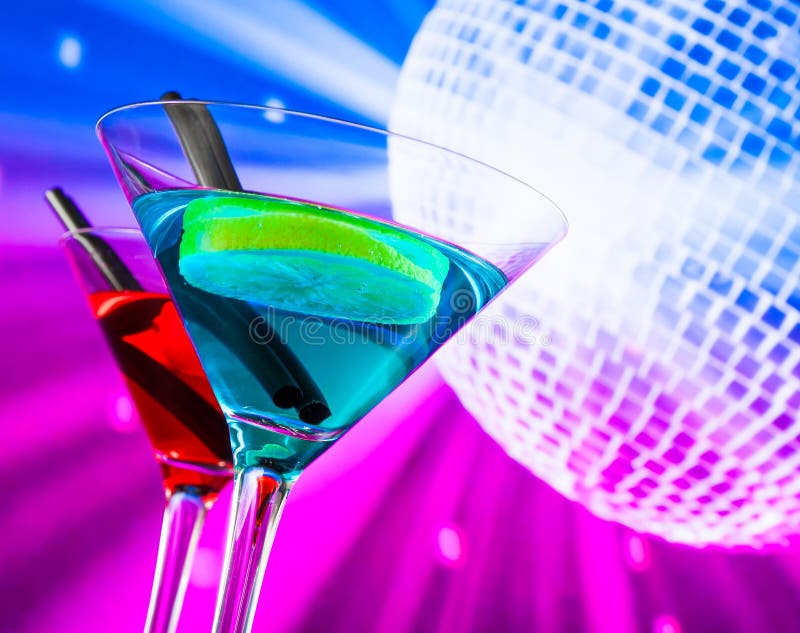 Red and Blue Cocktail with Sparkling Disco Ball Background with Space ...