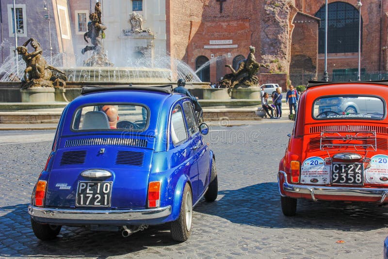 Red and Blue Vintage retro Fiat 500 mini cars on the historical centre of Rome. stock photos Red and Blue Vintage retro Fiat 500 mini cars on the historical centre of Rome. stock photos