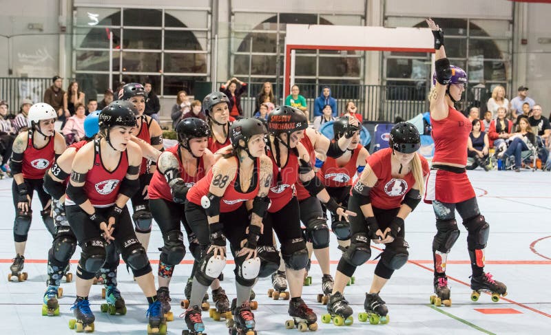 Redding, California:All the skaters from the Red Bluff Derby Girls team skate a introduction lap in a bout against Shasta Roller Girls. Redding, California:All the skaters from the Red Bluff Derby Girls team skate a introduction lap in a bout against Shasta Roller Girls.