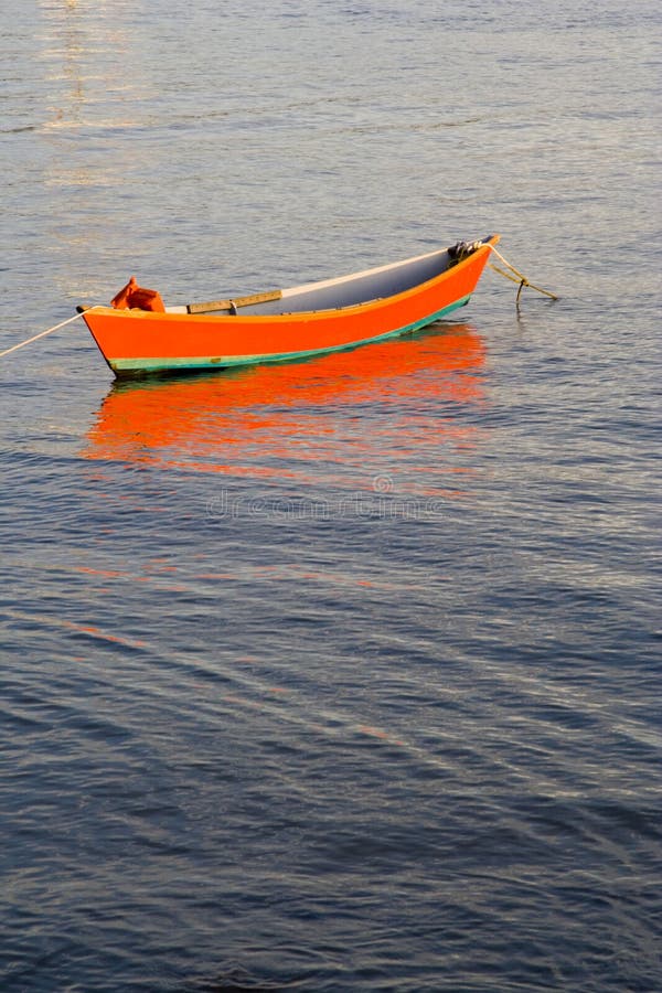 Red boat on water