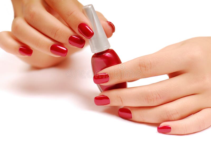 Red bottle of nail polish royalty free stock photography