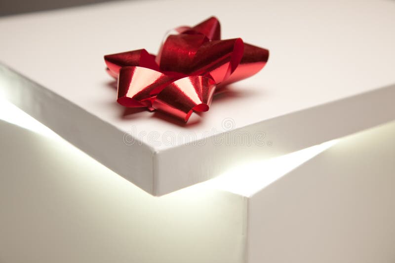 Red Bow Gift Box Lid Showing Very Bright Contents