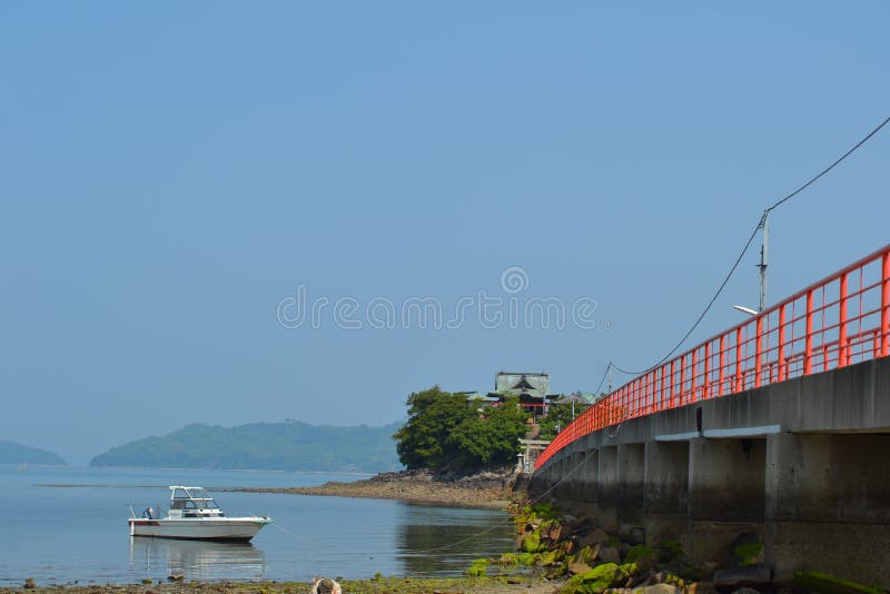Red bridge and boat stock image. Image of green, holiday 55628395