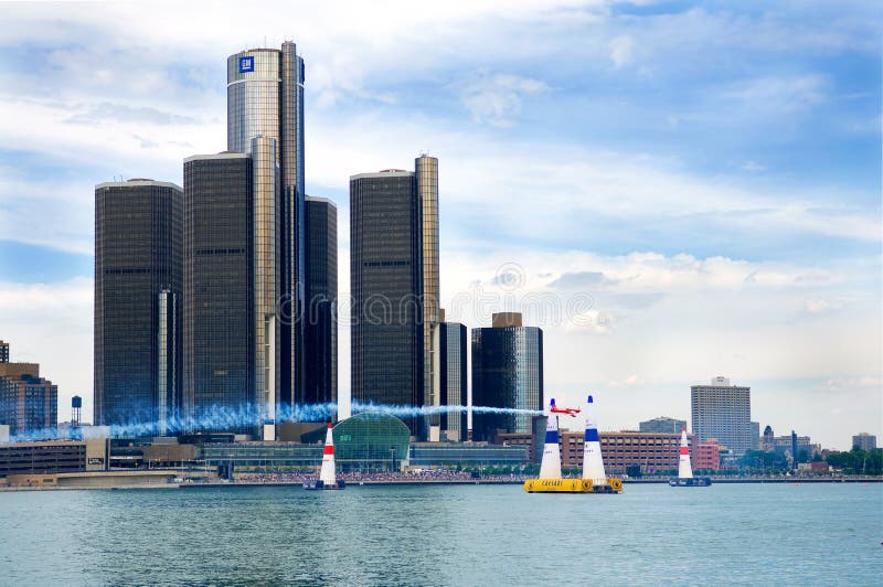 WINDSOR, ONT JUNE 5 - An airplane races down the Detroit River at the Red Bull Air Races June 5, 2010 on the Detroit River in Windsor, Ontario. Red pylons stock images, royalty-free photos and pictures