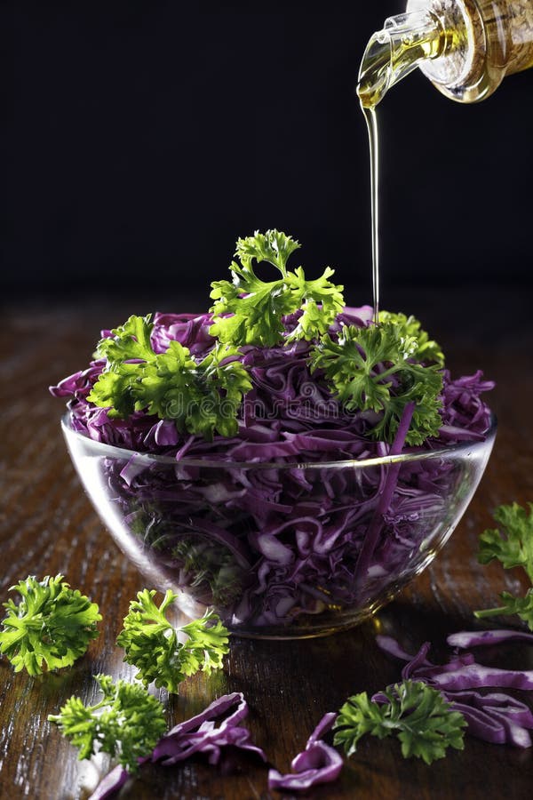 Red cabbage and oarsley salad dressing with olive oil