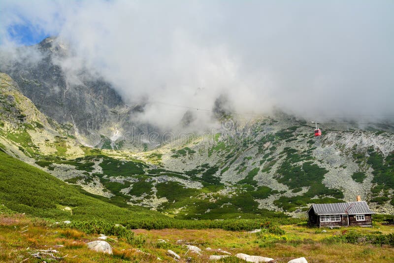 Red cable car from the Tatra Mountains to the Lomnicky Peak. Beautiful mountain landscape in Slovakia.