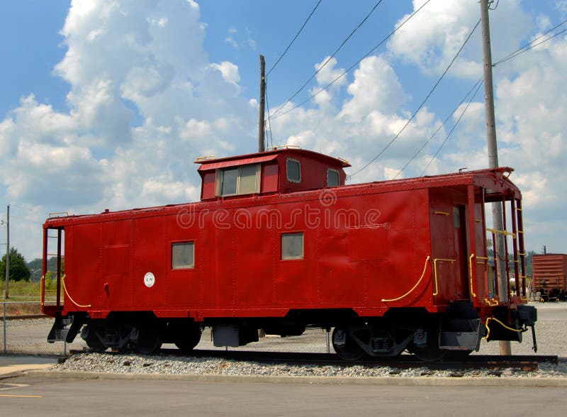 Red Caboose under sunny skies