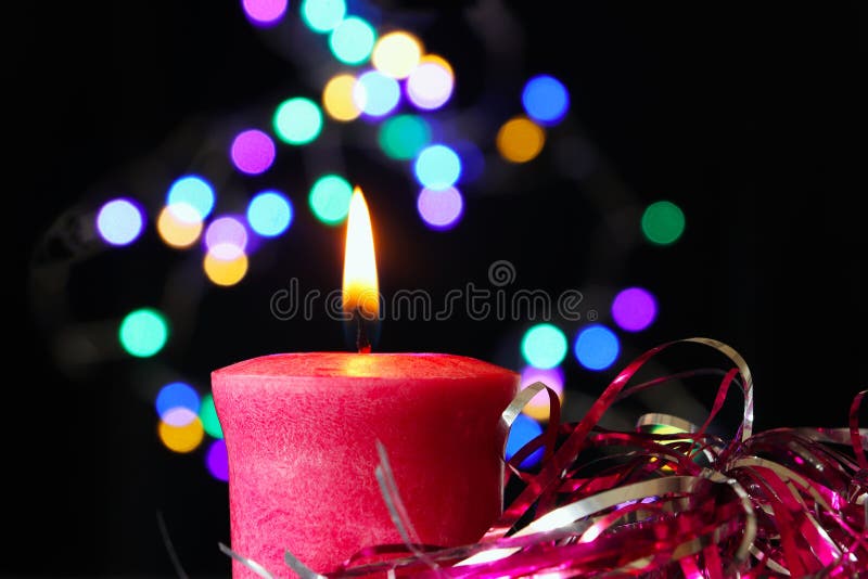 Red candle lit stock photo. Image of black, blackbackground 170594796