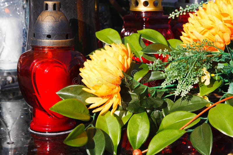 Red Candles and Artificial Flowers on a Grave Stock Photo Image of