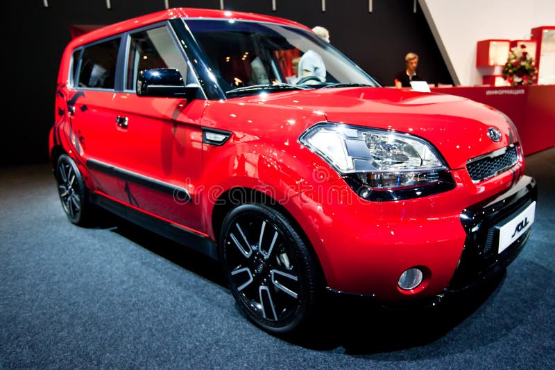 Red car Kia Soul