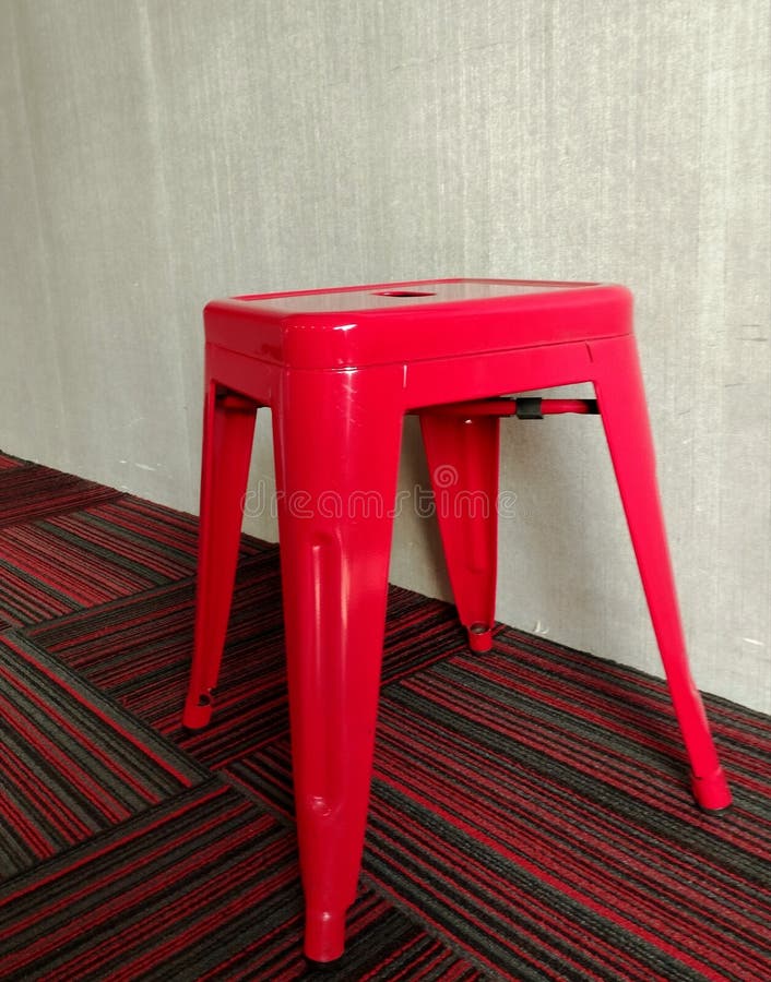 The Red Chair Stands Alone Waiting for Someone To Sit on it Stock Image