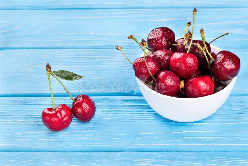 Red cherries in bowl